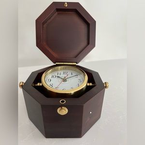 Howard Miller Chronometer 645-187. Cherry wood chest with solid brass clock.